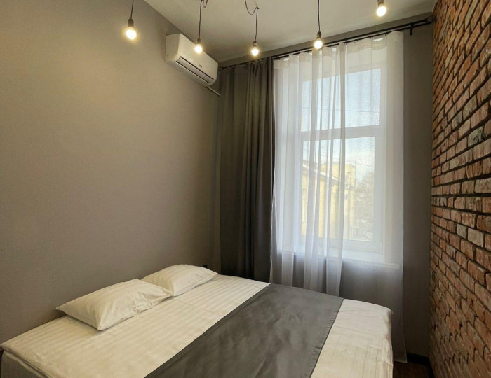 2-комнатные апартаменты люкс с 1 односпальной и 1 двуспальной кроватью - Апарт-отель «Лофт Апарт» Барнаул