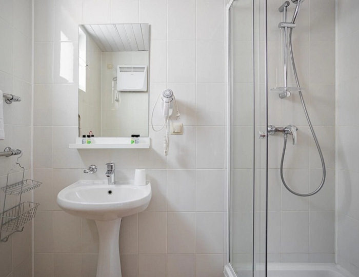 Стандарт с балконом на цокольном этаже - Отель Ski Village / Ски Вилладж Красная Поляна