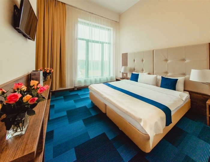 Номер категории "Люкс" с двуспальной кроватью - Отель SkyPoint / СкайПоинт Шереметьево