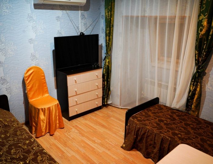 Номер улучшенный стандарт с 2 односпальными кроватями (с полупансионом) - Гостиница «Крым» Астрахань