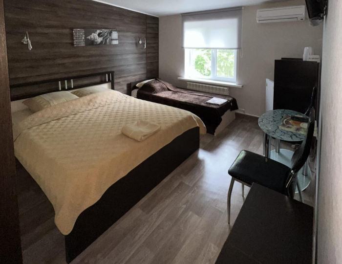 Номер улучшенный с 1 односпальной и 1 двуспальной кроватью - Мини-отель «Швеция» Воронеж