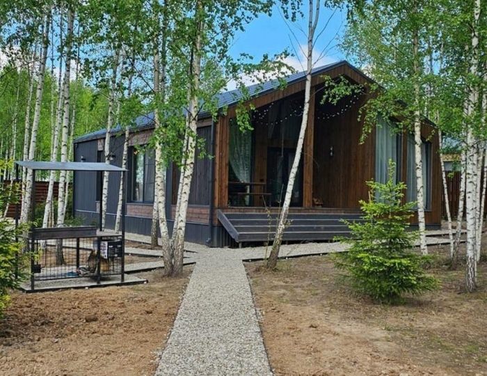 Коттедж «Пaноpaмный дом в хвойнoм лесу с сaуной» Ступино