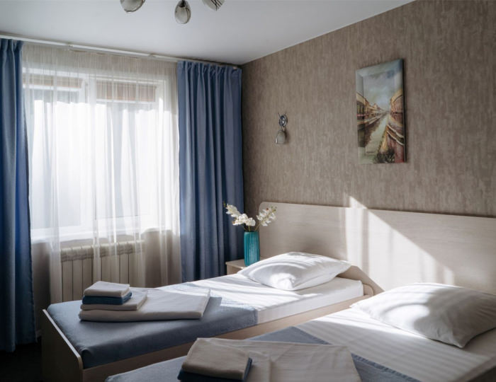 Улучшенный двухместный номер с двумя раздельными кроватями - Гостиница «Респект» Смоленск