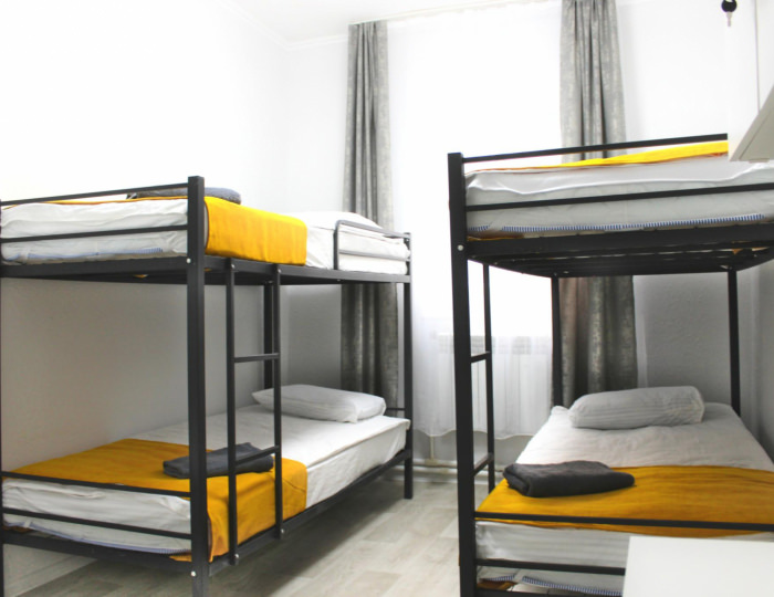 Кровать в 4-местном общем номере - Гостевой дом «Чемодан» Ханты-Мансийск