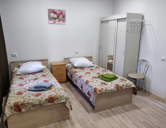 Кровать в 2-местном общем номере - Отель Hotel Salus / Салус Коряжма